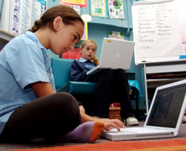 Girls working on laptops