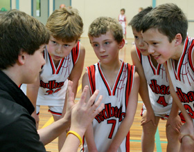 Boys playing basketball