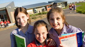 Students in front of school building