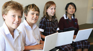 Students standing against wall