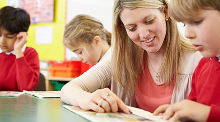 Girl writing at desk