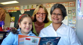 Teachers with young student.