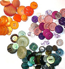 Image of a pile of clothes buttons of various sizes and colours.