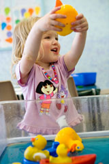 Child playing with toys