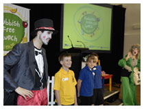 Entertainers with students at award ceremony
