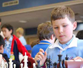 boy playing chess