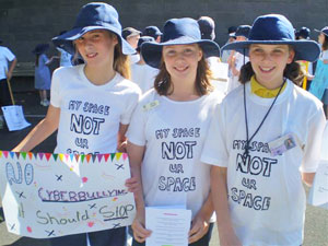 Students at Upper Ferntree Gully PS used billboards and t-shirts to raise awareness of cyber bullying during their local rally.