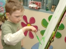 young boy painting