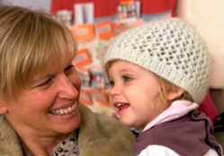 Mother holding daughter