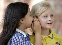 Girls Whispering
