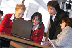 students viewing computer