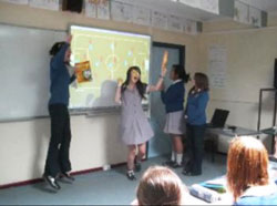 Students using interactive whiteboard