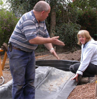 Photo of people engaged in outdoor work