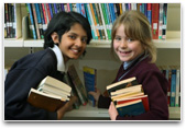 2 students in a library