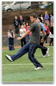 Student playing footy