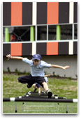Student jumping hurdles