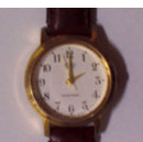 Analgoue clock showing 2:00