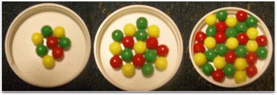3 sets of marbles with different amounts in each set