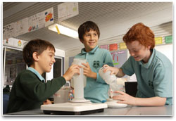 School kids experimenting in a laboratory