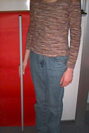 Student with one metre plastic pipe