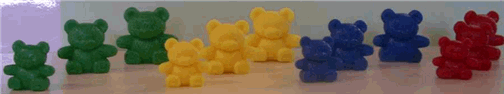 4 sets of 3 little teddy bears. 3 green, 3 yellow, 3 blue, 3 red