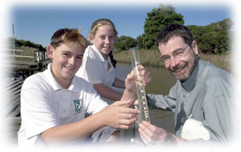 students and teachers conducting experiment